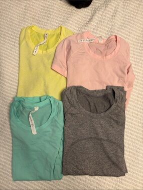 lululemon athletica swiftly short sleeve - Pink, Yellow, Teal, grey. lot of 4